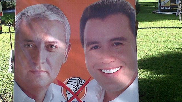 A campaign sign for Otto Perez Molina, left, who is leading in the polls in Guatemala's presidential election.