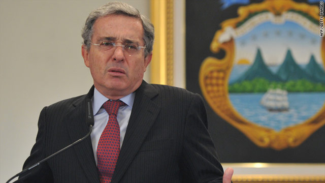 Alvaro Uribe, speaking at a press conference in August, denies he ordered his political opponents to be wiretapped.