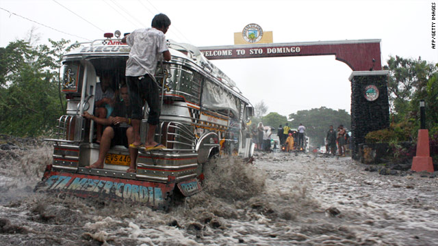 A passenger jeepney traverses a flooded road in the town of Sto. Domingo, southeast of Manila on December 30, 2010.