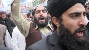 Protesters gather in Rawalpindi to warn Pope Benedict XVI to stay out of Pakistan's blasphemy laws.