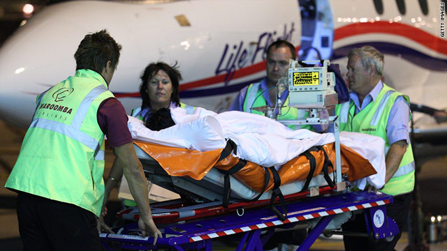An injured survivor of the Christmas Island boat wreck arrives at the Perth Airport on December 16, 2010.