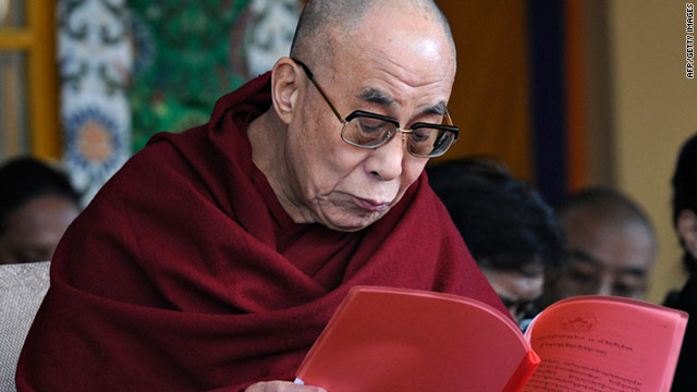 The Dalai Lama reads a statement during a ceremony marking the 52nd anniversary of the 1959 uprising.