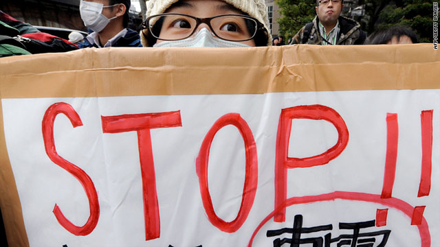 Demonstrators outside the Tokyo Electric Power Company building in Tokyo on Sunday call for an end to nuclear power.
