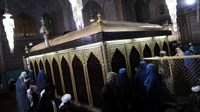 Afghans pray inside the Hazrat-i Ali shrine in Mazar-i-Sharif where an angry mob stormed a U.N. compound on April 1.