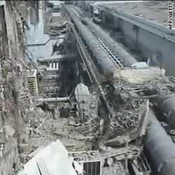 Damaged Japan reactors will take 9 months to shut down