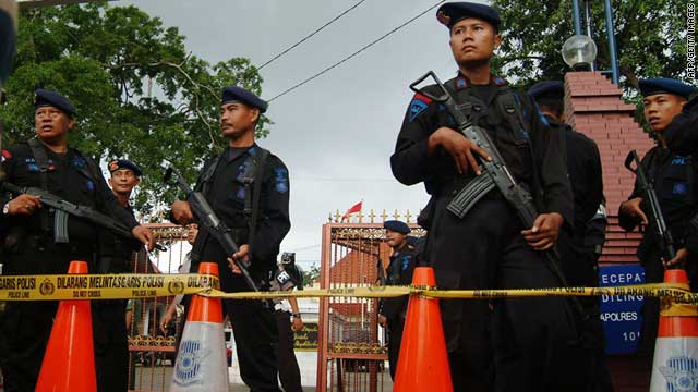 Indonesian officers outside the police station in the city of Cirebon after the suicide attack last Friday.