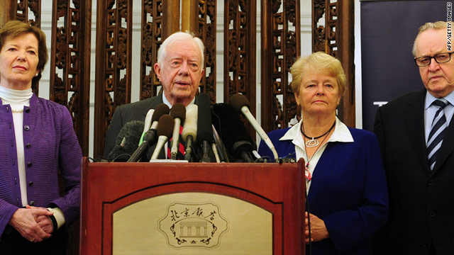 Mary Robinson, Jimmy Carter, Gro Brundtland and Martti Ahtisaari, shown at a news conference.