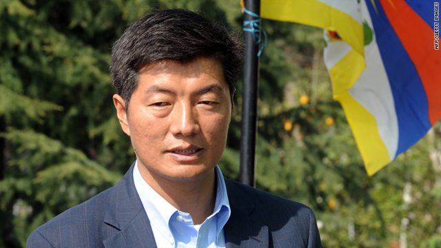 Lobsang Sangay stands by a Tibetan flag during his election campaign in Dharamshala on March 18, 2011.