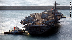 The religious rites were conducted on the deck of the USS Carl Vinson in the Arabian Sea.