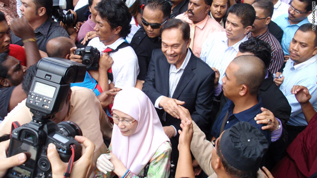 Anwar Ibrahim, center, has repeatedly claimed the trial is an attempt to derail his political career.