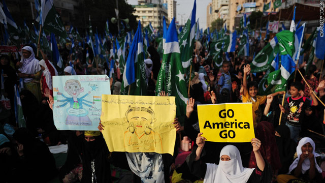 Activists of Jamaat-e-Islami Pakistan hold anti-US placards at a Karachi demonstration against US drone attacks on June 5.