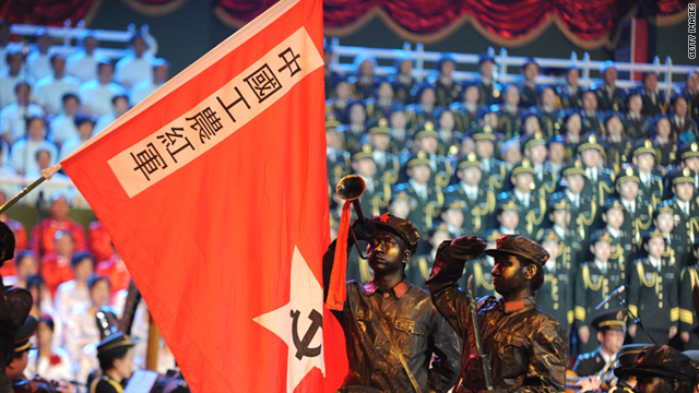 Soldiers and civilians perform "red" songs at Shijingshan Stadium on Tuesday in Beijing, China.