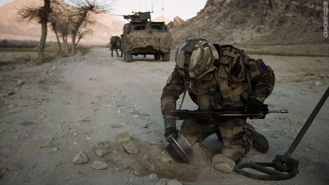 A mine clearing specialist from the French Foreign Legion searches for improvised explosive devices on a road on January 25.