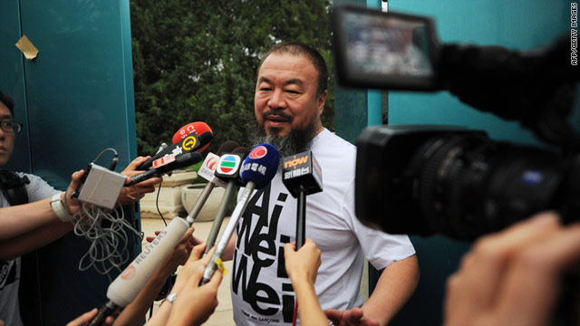 Outspoken Chinese artist Ai Weiwei to speaks to reporters outside his studio in Beijing after his detainment by Chinese authorities.