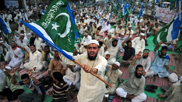 An activist protests against U.S. drone attacks during a rally in Karachi, Pakistan, on June 4.