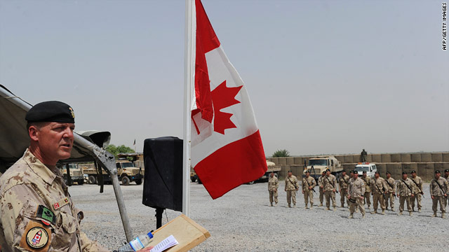 Canadian Brig. Gen. Dean Milner presides over a handover ceremony to U.S. troops Tuesday in Kandahar province.