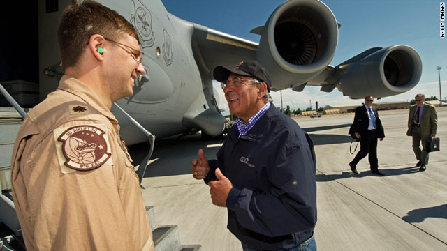 U.S. Defense Secretary Leon Panetta greets Maj. Michael Schwan after landing Saturday in Kyrgyzstan enroute to Afghanistan.