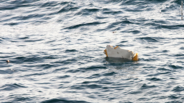 Debris from an Asiana Airlines cargo plane floats 100 kilometres west of South Korea's southern island of Jeju Thursday.