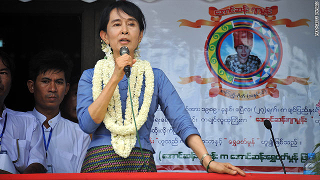 Aung San Suu Kyi talks Sunday during an opening ceremony for a library in Bago, north of Yangon.