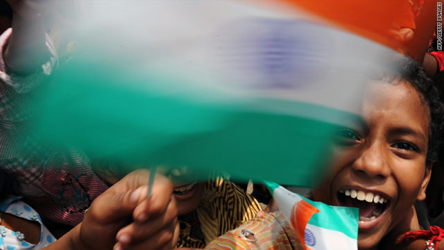 An Indian child waves his national flag during celebrations marking the country's Independence Day in Kolkata.