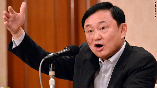 Former Thai Prime Minister Thaksin Shinawatra speaks before the press in Tokyo on Tuesday.