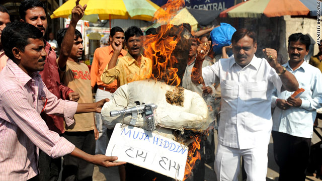 Activists from India's Congress Party burn an effigy representing the 'Indian Mujahideen' organisation in Mumbai in 2010.