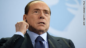 Italian Prime Minister Silvio Berlusconi says his opponents are throwing "mud" in an effort to get rid of him.