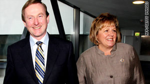 Fine Gael leader Enda Kenny and his wife arrive at a ballot counting center in Castlebar, Ireland, on Saturday.