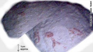 A close-up view of the red marks on the floor in the pyramid