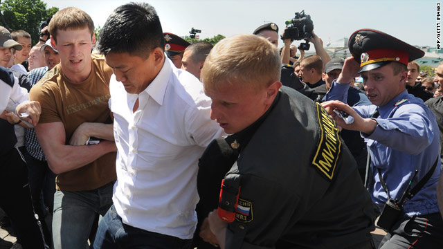 Russian police detain American gay rights activist Dan Choi on Saturday in central Moscow.