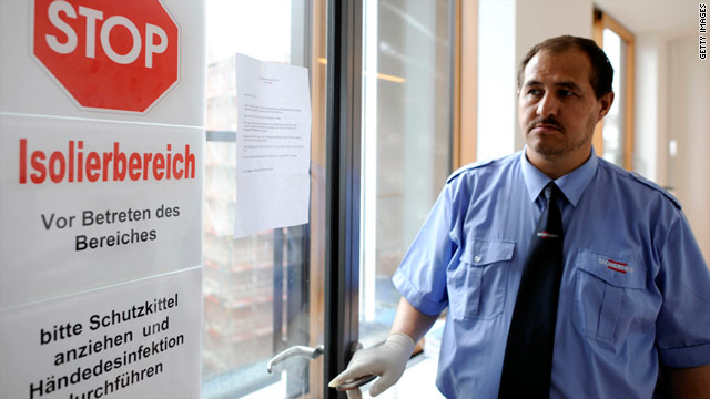 A sign at the entrance of a hospital isolation area in Hamburg, Germany, warns people of E. coli-infected patients.