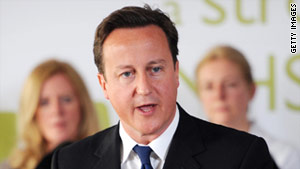 UK Prime Minister David Cameron says time is "running out" for Libyan leader Moammar Gadhafi.