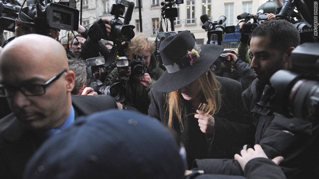 John Galliano pictured at a French police station in February. The designer is on trial, accused of making anti-Semitic comments.