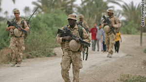 British officers patrol Basra in 2009 (Photo Courtesy of CNN/Getty Images).