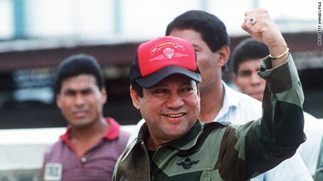 Manuel Noriega pictured in October 1989 waving as he left his headquarters in Panama City following a failed coup against him