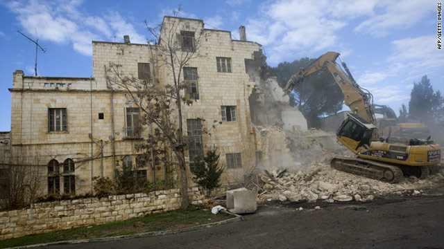 Israeli bulldozers are demolishing the Shepherd Hotel in East Jerusalem to make way for new Jewish settlement homes.