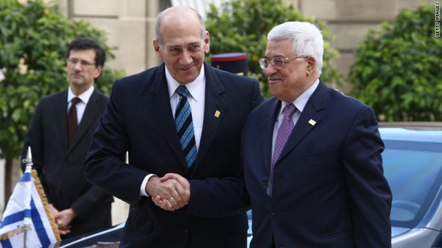 ehud olmert and shimon peres shaking