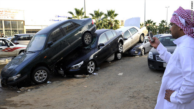 Vehicles are piled up following heavy rains and floods in Jeddah, Saudia Arabia on January 27, 2011.