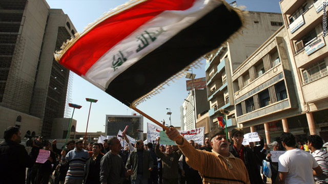 Iraqi men protest against corruption in central Baghdad on February 18, 2011.