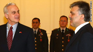 U.S. Ambassador Francis Ricciardone, left, is greeted by Turkish President Abudullah Gul in Ankara on Thursday.