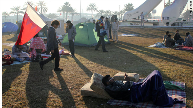 Anti-government protesters camp at Manama's Pearl roundabout, February 20, 2011, after security forces pull out.