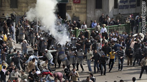 Riot police disperse crowds in Tahrir Square on January 28, 2011.