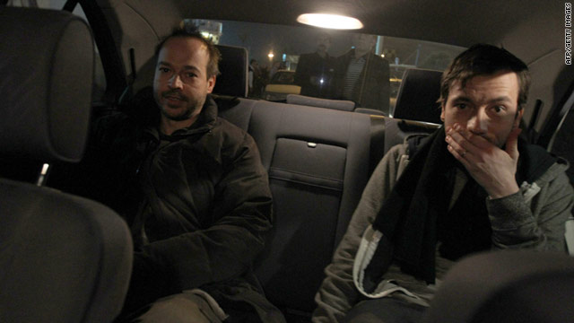German reporters Marcus Hellwig and Jens Koch arrive at Tehran's Mehrabbad Airport from Tabriz on February 19, 2011.