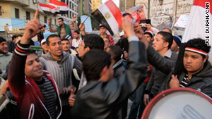 Egyptians march in Tahrir Square in Cairo during the 18-day protests.