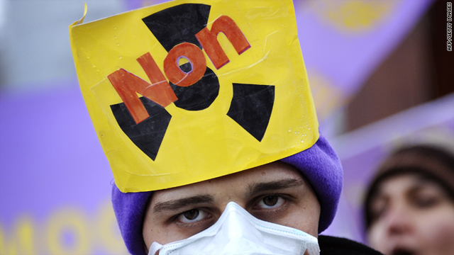 An Iranian opposition supporter holds a sign reading "No to Nuclear" protests on December 6, 2010 in Geneva as world powers met with Iran over its disputed nuclear program.
