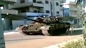 A still taken from a YouTube video on April 25, 2011, reportedly shows an army tank in the town of Daraa.