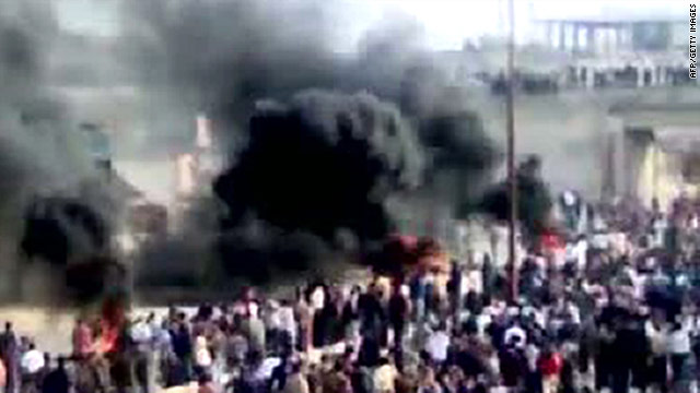 A frame from a video downloaded from YouTube shows thick smoke rising during a demonstration in Moaret Al-Noman on Friday.