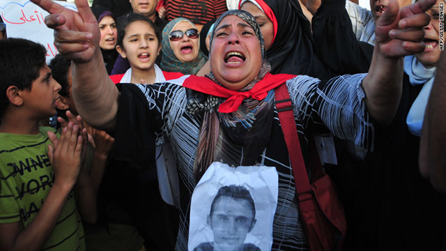 An Egyptian woman shouts slogans during a rally on the first anniversary of the death of Khaled Said on June 06.