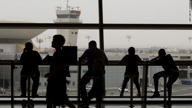 Passengers wait at Israel's Ben Gurion International Airport. The airport is on high alert ahead of the arrival of pro-Palestinian demonstrators.