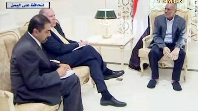 John Brennan, middle, urged President Ali Abdullah Saleh, right, to resolve the political crisis in Yemen, the White House says.
